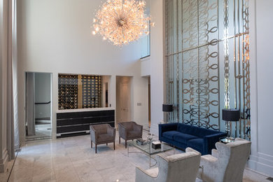 Example of a large trendy formal and open concept marble floor and white floor living room design in Dallas with white walls, no fireplace and no tv
