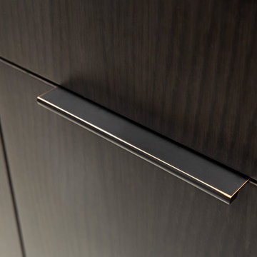 Modern Slab door cabinets with oil rubbed bronze finger pulls