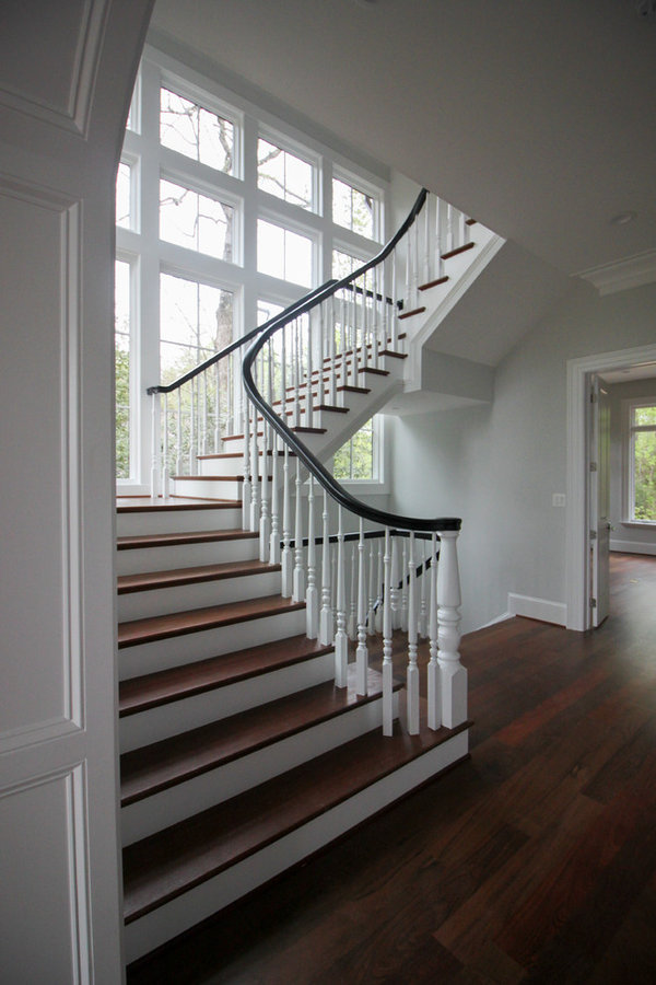 Powerful Impression by Floating Staircase in Suburban Foyer