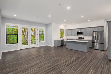 Example of a transitional living room design in Seattle