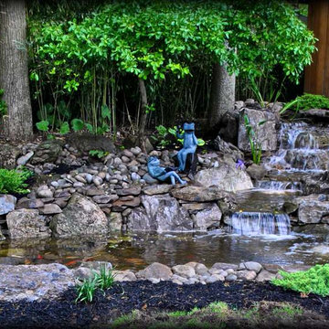 Moss Rock Koi Pond by Full Service Aquatics. Project site West Orange, NJ.