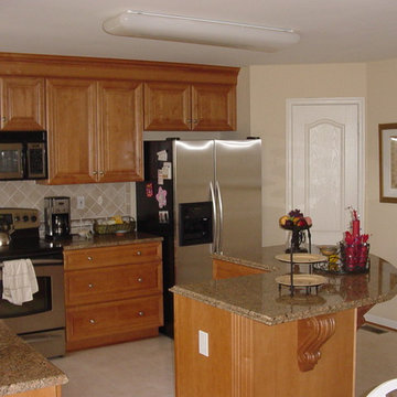 Traditional Maple Kitchen with Island and Wine Rack in Hunt Valley, MD