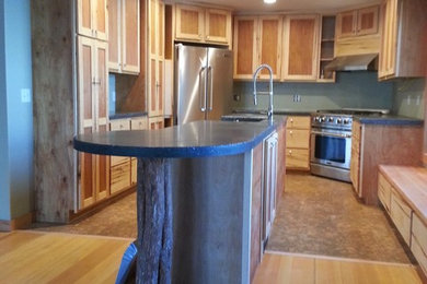 Mountain style kitchen photo in Burlington