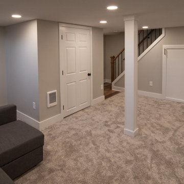 Bathroom/Laundry Room Using Warmer Tones, Accented by New Laundry Facility