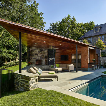 Modern Pool House for Sloped Site