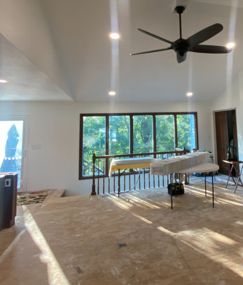 Hickory newel posts, railing, black balusters + stair trim/molding