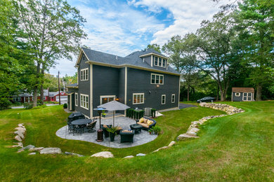 Patio - mid-sized traditional backyard concrete paver patio idea in Boston with no cover