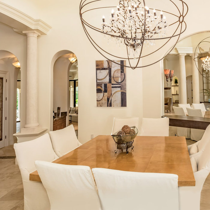 Dining Room in a Palmer's Creek Contemporary in Sarasota, Florida. Design by Doshia Wagner of NonStop Staging. Photography by Christina Cook Lee.