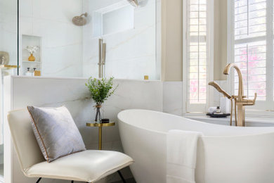 Example of a large trendy master white tile and porcelain tile porcelain tile and gray floor freestanding bathtub design in Tampa with a niche