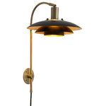 Nova of California - Rancho Mirage Wall Sconce - Matte Black - Elevate your wall with the beautiful Rancho Mirage Wall Sconce, a vintage-inspired elegant luminaire that graces your space with captivating illumination. Meticulously crafted, this wall sconce features a weathered brass finish and a matte black tiered shade, creating a mesmerizing interplay of light and shadow. The hand-applied gold-leaf finish beneath the shade casts a warm and inviting glow, transforming your walls into a canvas of ambient charm and refined style. Its adjustable shade lets you direct lighting where you need it most - pair two for symmetrical look around your bed, mirrors or reading nook. Its plug-in and convertible with a inline dimmer switch - Contract Grade and built to last a lifetime