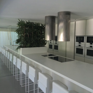 White Kitchen Island Beside the Garden