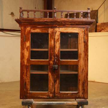 Trim Repair and Full Restoration: Documented 1894 Bookcase on Table