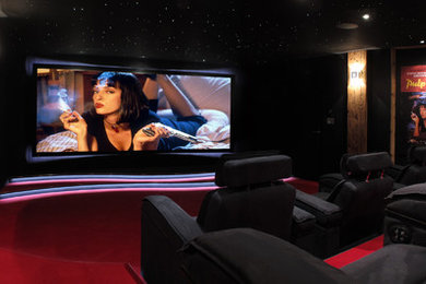 Inspiration for a large contemporary home theatre.