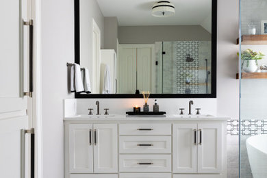 Inspiration for a medium sized classic ensuite bathroom in Dallas with shaker cabinets, white cabinets, a freestanding bath, white walls, porcelain flooring, a submerged sink, engineered stone worktops, grey floors, an enclosed toilet, double sinks and a built in vanity unit.