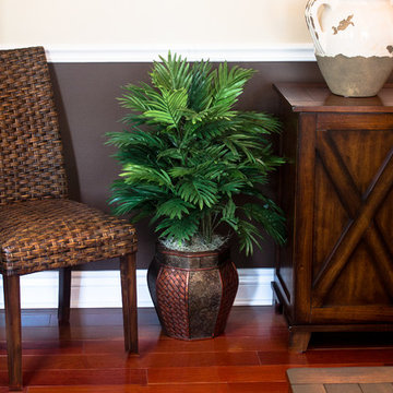 Wicker Woven Chair with Lucious Palm and Southern Inspired Accents