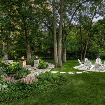 Flagstone patio and raised stone fire pit