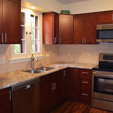 Shaker cabinets with travertine
