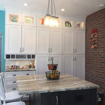 Omega Loring Full Access Transom Cabinetry with Fantasy Brown Quartzite Counters