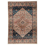 Jaipur Living - Vibe by Jaipur Living Elizar Medallion Blush/Blue Area Rug, 7'10"x11'1" - Inspired by the vintage perfection of sun-bathed Turkish designs, the Myriad collection is warm and inviting with faded yet moody hues. The Elizar rug boasts a romantically distressed center medallion in contemporary tones of dusty pink, deep blue, and taupe with ivory fringe trim for added texture and antique allure. This power-loomed rug features a plush and durable blend of polyester and polypropylene, lending the ideal accent to high-traffic spaces.