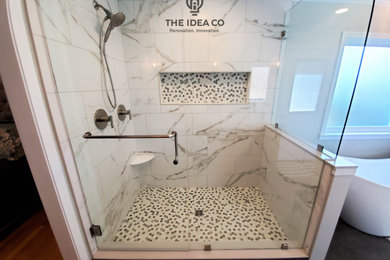 Example of a classic ceramic tile corner shower design in Other