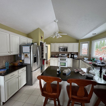 Two Tone Kitchen with Wood & Irish Creme Painted Cabinets w/ Quartz Countertop