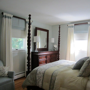 Tab Draperies with Shirred Tab Sleeves on Decorative Wood Poles, over Flat Roman