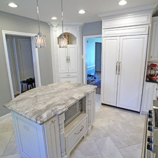 Small traditional kitchen pantry photos - Inspiration for a small timeless u-shaped marble floor kitchen pantry remodel in St Louis with an undermount sink, raised-panel cabinets, white cabinets, granite countertops, stainless steel appliances and an island