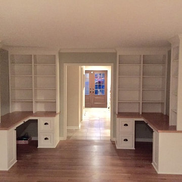 The desks are all maple construction with the tops stained Early American and th