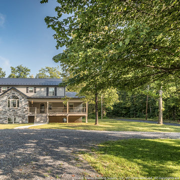 Amish House with Textured Black Metal Roof