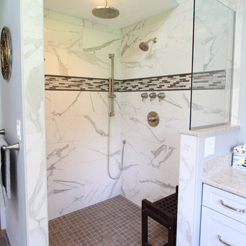 Gray Vanity with Freestanding Tub and Tiled Walkin Shower