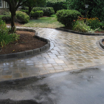 Ideal Millstone Paver with curbstone edging