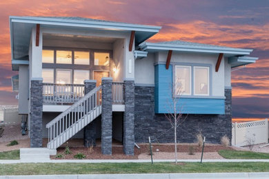 Minimalist stucco house exterior photo in Denver