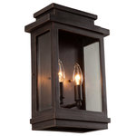 Artcraft - Fremont 2-Light  Oil Rubbed Bronze Outdoor Light - Backed by our industry leading warranty  the Freemont Collection pocket sconce features clean lines encasing a clear three side glass  to make a contemporary style outdoor sconce. Available in Black or Oil Rubbed Bronze  Warranty  5 year warranty against premature paint defects and a 25 year limited warranty against corrosion.  Artcraft products are made of the finest material available and are carefully manufactured,old fashion Artisans using the most advanced techniques in order to provide you beautiful lighting.  Although user serviceable items like bulbs  ballasts and transformers do require periodic replacements  we use only the highest performance components available. We thank you for choosing Artcraft.