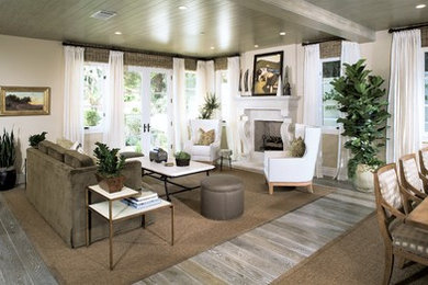 Inspiration for a mid-sized transitional open concept medium tone wood floor living room remodel with beige walls, a standard fireplace, a tile fireplace and no tv