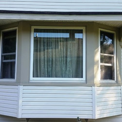 Vinyl Replacement windows & American Classic Insulated siding - Products