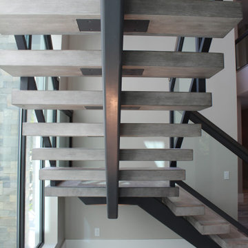 Steel Center Stringer with 4" Thick White Oak Treads & Tempered Glass