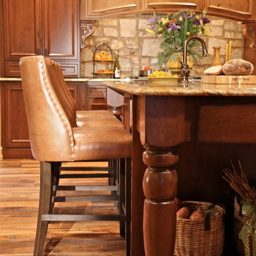 Mediterranean Luxury Kitchen Remodel | Stone Accents & Arched Detailing