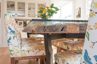 Inspiration for an industrial light wood floor kitchen/dining room combo remodel with white walls