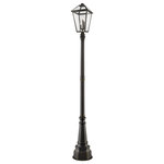 Z-Lite - Talbot 3 Light Outdoor Post Mounted Fixture in Rubbed Bronze - Bring welcomed ambient lighting to an exterior front or back walkway with a classic fixture reflecting a charming village theme. Made from rich Rubbed Bronze metal and seedy glass panels this three-light outdoor post mounted fixture delivers a fresh upgrade with detailed design work on its industrial-inspired post.andnbsp