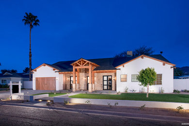 Farmhouse home design photo in Phoenix
