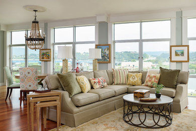 Living room - mid-sized traditional open concept medium tone wood floor living room idea in Other with blue walls