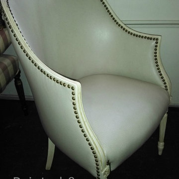 Cream faux leather chair with nail heads