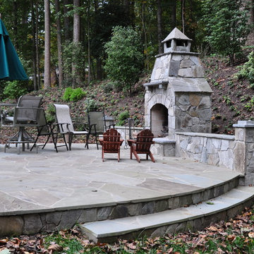 Chocolate Grey Outdoor Fireplace and Seating wall with Pennsylvania Blue Patio