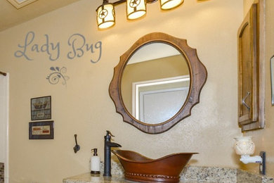 Inspiration for a rustic bathroom remodel in Austin