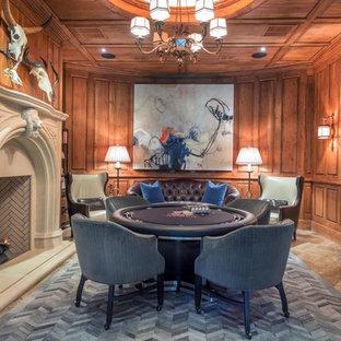 Inspiration for a medium sized classic basement in Atlanta with a standard fireplace, brown walls, travertine flooring and a stone fireplace surround.