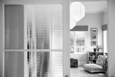 Mid-sized contemporary enclosed living room in Auckland.