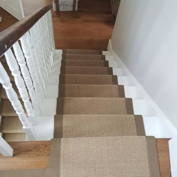 Brown Carpet with Brown Edgings Installed to Stairs