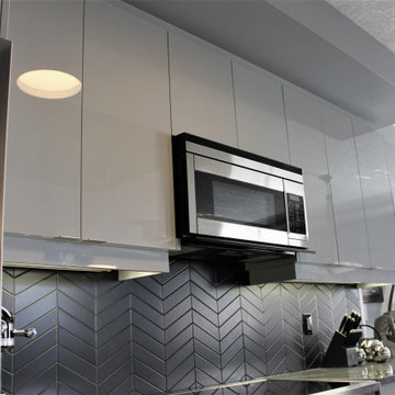 Contemporary high gloss kitchen in downtown luxury condo