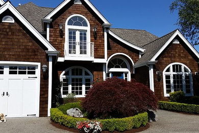 Example of a large classic home design design in Seattle