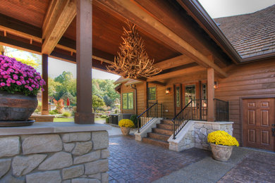Inspiration for a rustic exterior home remodel in St Louis